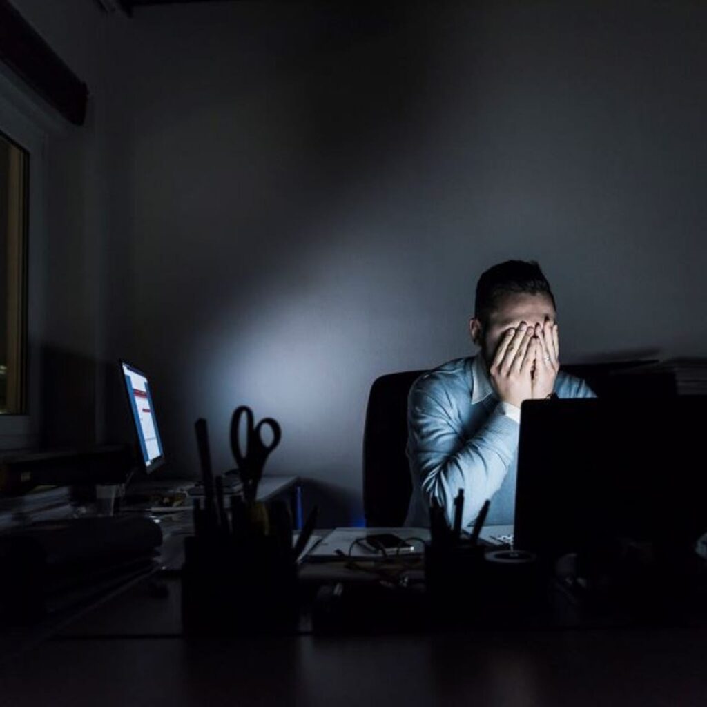 tired employee exhausted from digital burnout